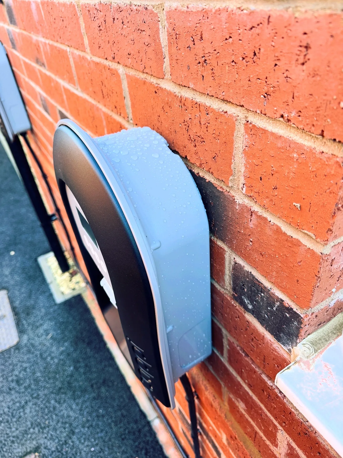 Second Zappi EV charger installation view showing cable containment and neat external finish