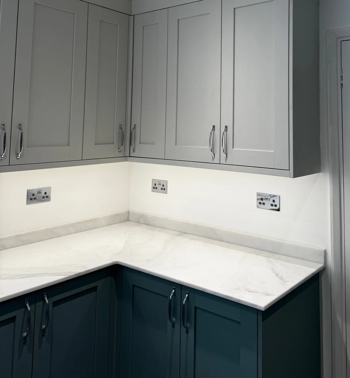 Finished Northampton kitchen rewire with under-pelmet LED lighting and polished chrome sockets
