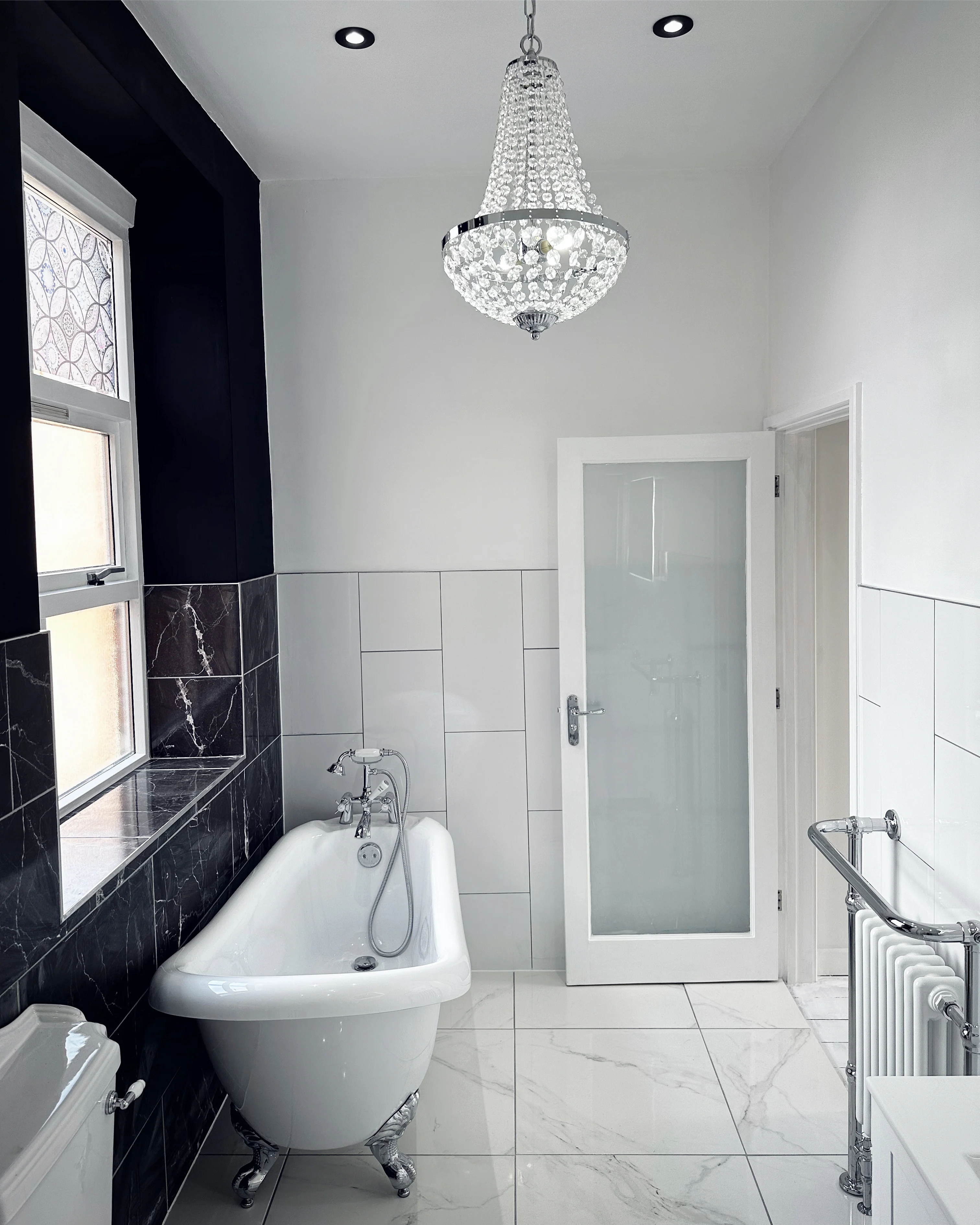 Freestanding bath bathroom renovation with LED feature lighting
