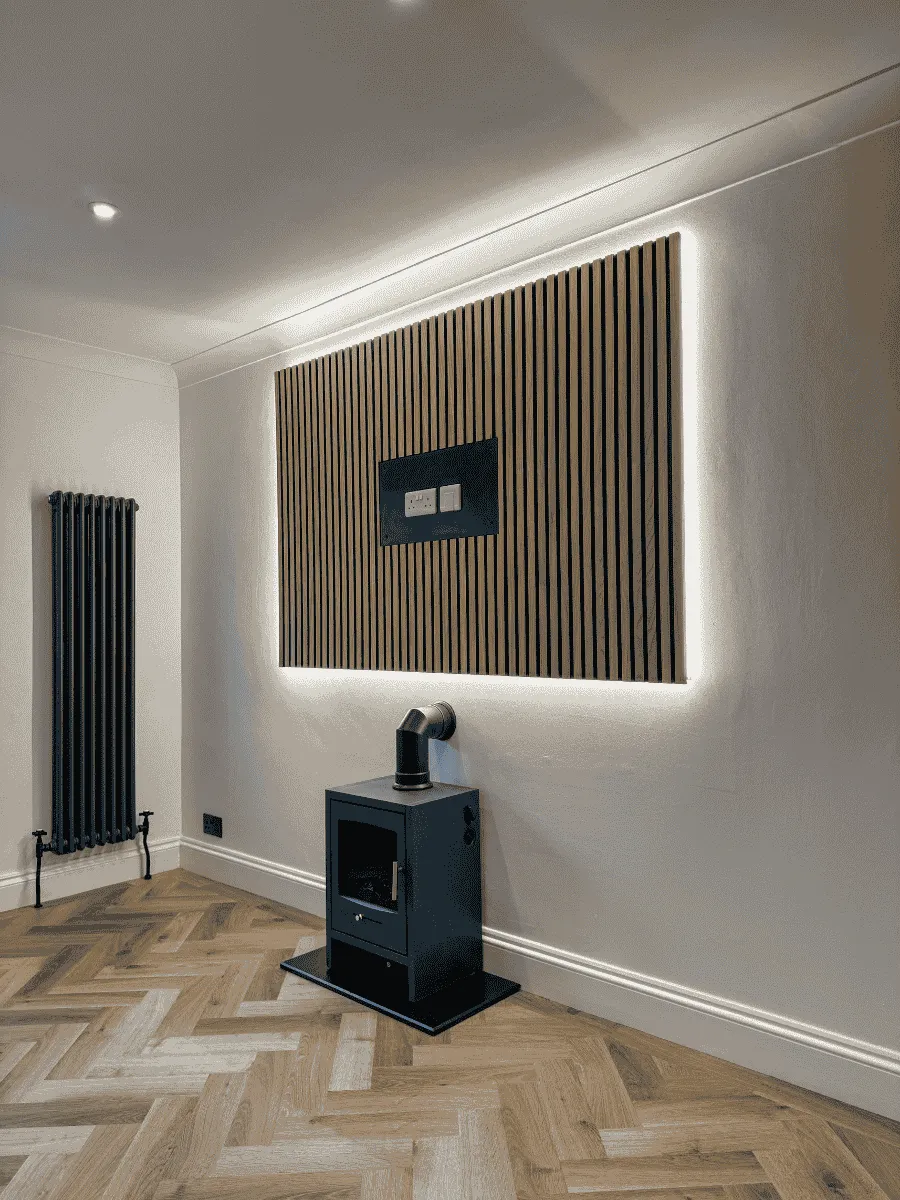 Acoustic slat TV feature wall with LED back-lighting and hidden socket